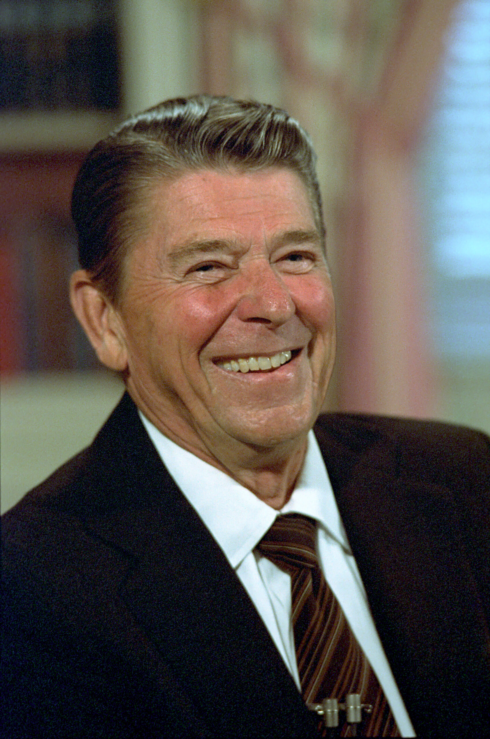 9/22/1982 Close up of President smiling during Taping sessions in Library